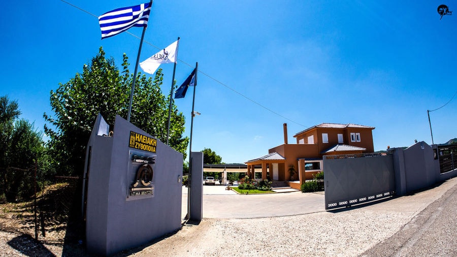 Front view of building of Elis Brewery with a pancard with their logo company at left